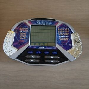 Vtg Who Wants To Be A Millionaire Handheld Electronic LCD Tiger Game Tested Work